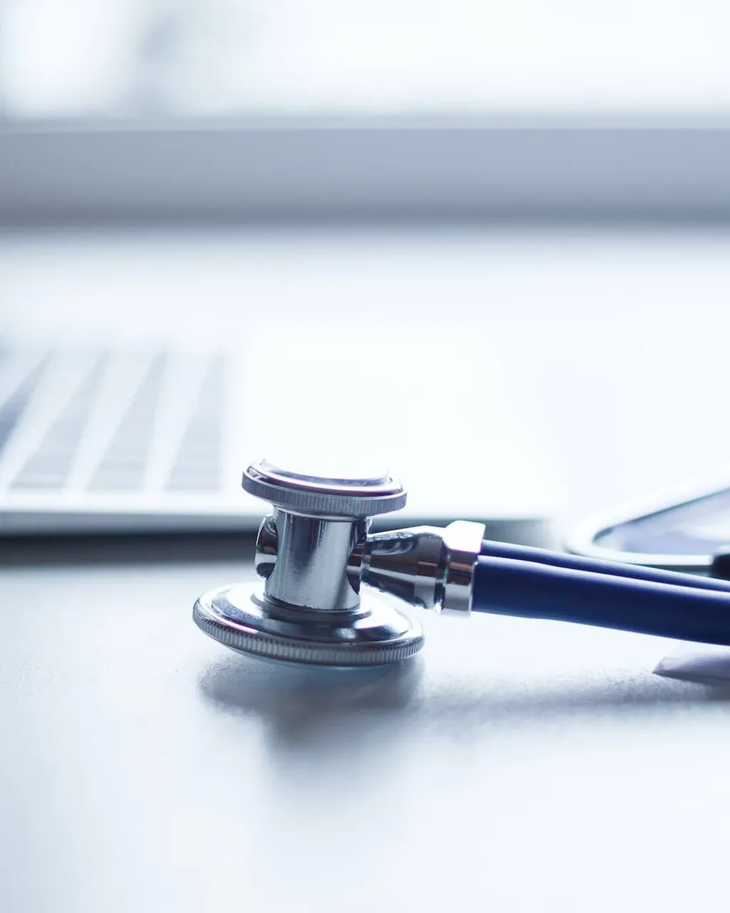 Provider reviewing labs and health history at a consultation desk